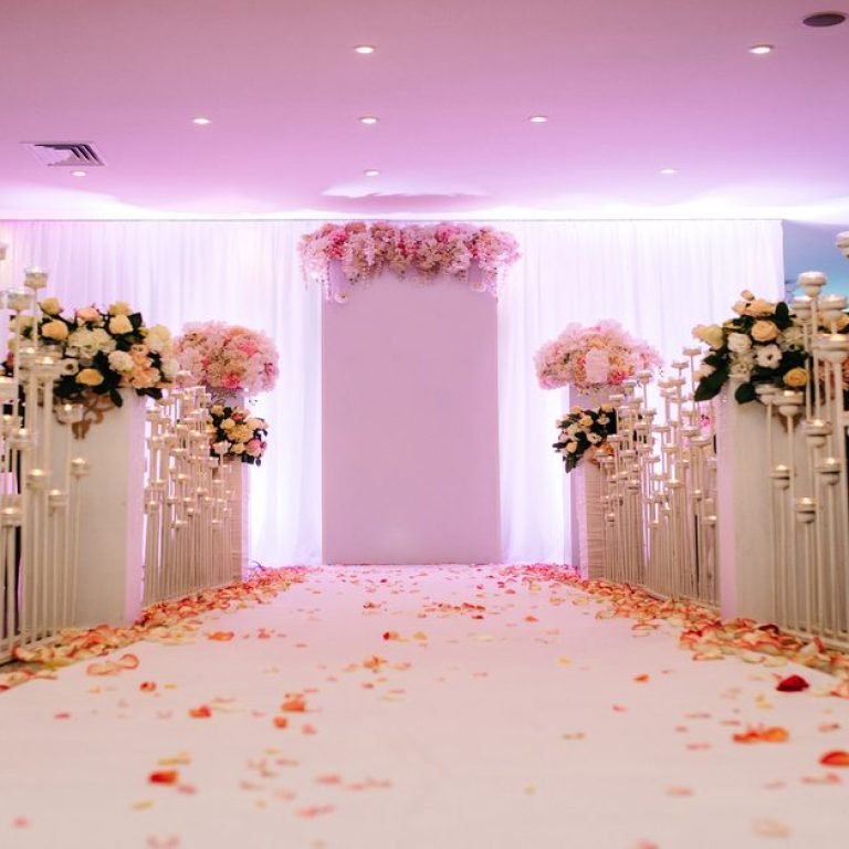 wedding ceremony in the woods among the trees on the green track
